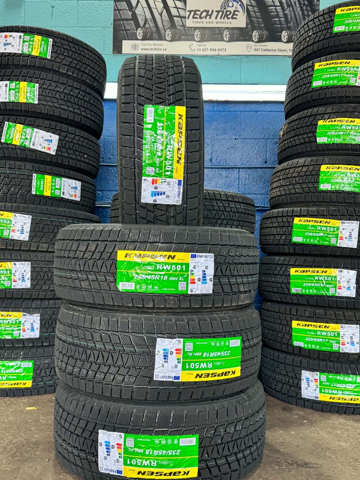 Kapsen RW501 winter tires stacked under the Tech Tire sign at 447 Catherine St, Ottawa